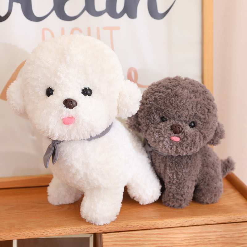 White and dark plush dog dolls shown together